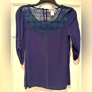 Really cute navy xs blouse with some lace. In excellent condition!